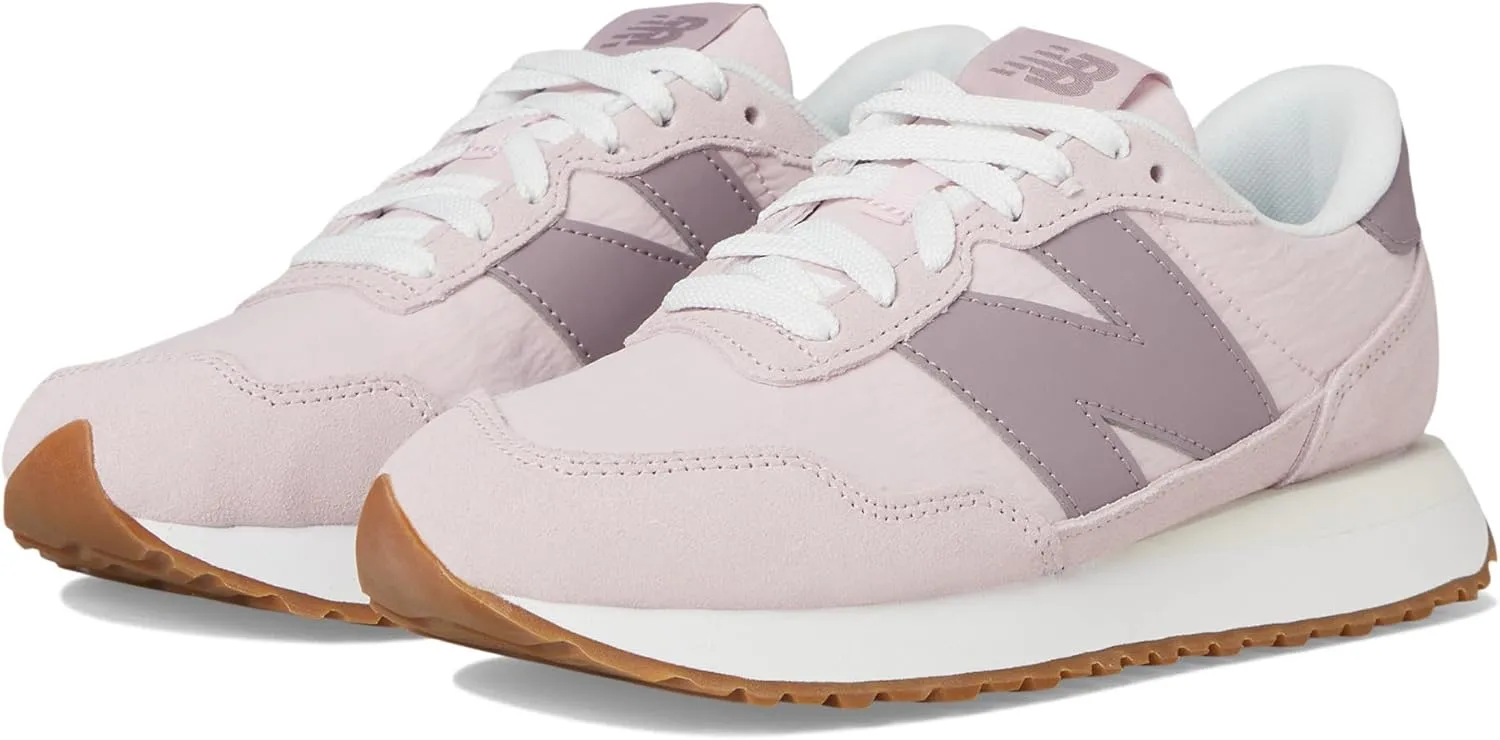 New Balance Women's 237 V1 Sneaker, Pink, 7.5